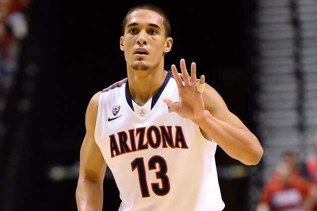LAS VEGAS, NV - MARCH 15:  Nick Johnson #13 of the Arizona Wildcats signals teammates during the championship game of the Pac-12 Basketball Tournament against the UCLA Bruins at the MGM Grand Garden Arena on March 15, 2014 in Las Vegas, Nevada. UCLA won 75-71.  (Photo by Ethan Miller/Getty Images)