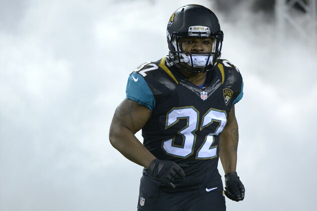 Jacksonville Jaguars running back Maurice Jones-Drew (32) runs onto the field during player introductions prior to an NFL football game against the Houston Texans in Jacksonville, Fla., Thursday, Dec. 5, 2013.(AP Photo/Phelan M. Ebenhack)