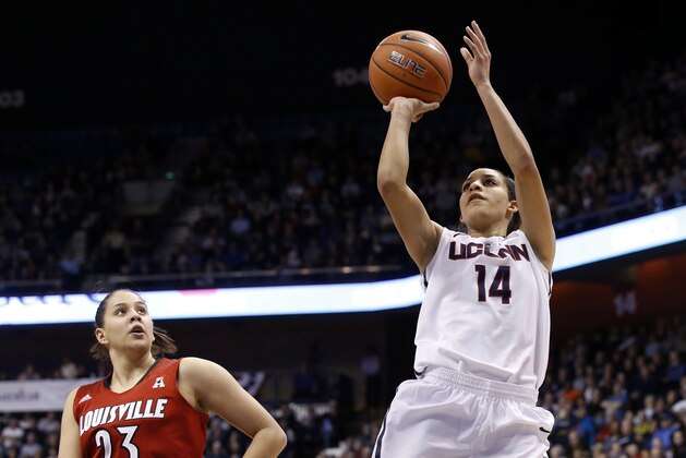 Mar 10, 2014; Uncasville, CT, USA; Connecticut Huskies guard Bria Hartley (14) shoots against Louisville Cardinals guard Shoni Schimmel (23) during the first half in the championship game of the American League Athletic Conference Tournament at Mohegan Sun Arena. Mandatory Credit: David Butler II-USA TODAY Sports