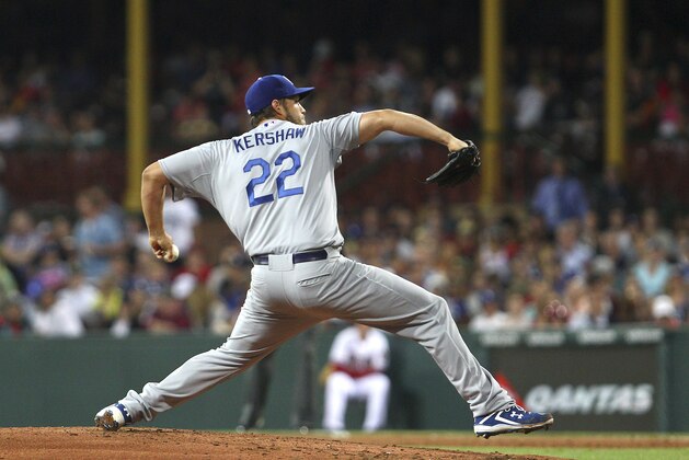 Dodgers' Clayton Kershaw pitches during the the Major League Baseball opening game between the Los Angeles Dodgers and Arizona Diamondbacks at the Sydney Cricket Ground in Sydney, Australia Saturday, March 22, 2014. The Dodgers won the game 3-1. (AP Photo/Michelle O'Connor)