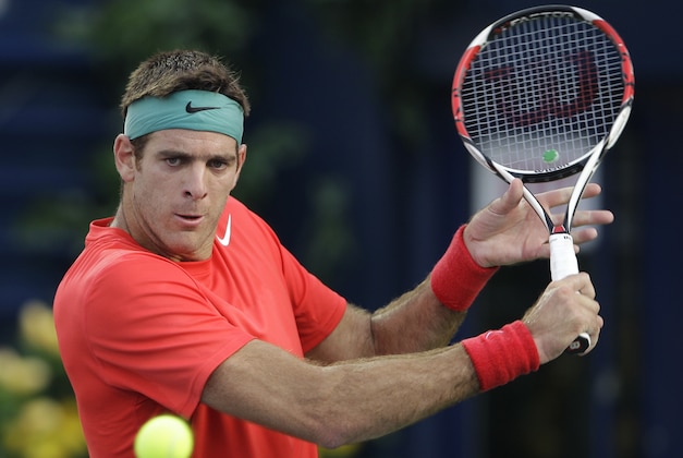 Juan Martin Del Potro of Argentina returns the ball to Somdev Devvarman of India during the second round of the Dubai Duty Free Tennis Championships in Dubai, United Arab Emirates, Tuesday, Feb. 25, 2014. (AP Photo/Kamran Jebreili) Juan Martin Del Potro of Argentina returns the ball to Somdev Devvarman of India during the second round of the Dubai Duty Free Tennis Championships in Dubai, United Arab Emirates, Tuesday, Feb. 25, 2014. (AP Photo/Kamran Jebreili)