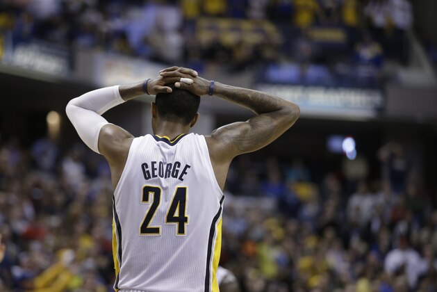 Indiana Pacers' Paul George (24) in action during the second half of an NBA basketball game against the Golden State Warriors Tuesday, March 4, 2014, in Indianapolis. Golden State defeated Indiana 98-96. (AP Photo/Darron Cummings)