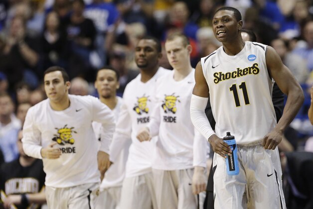 Wichita State forward Cleanthony Early (11) watches action against Cal Poly from the sideline during the second half of a second-round game in the NCAA college basketball tournament Friday, March 21, 2014, in St. Louis. (AP Photo/Charlie Riedel)