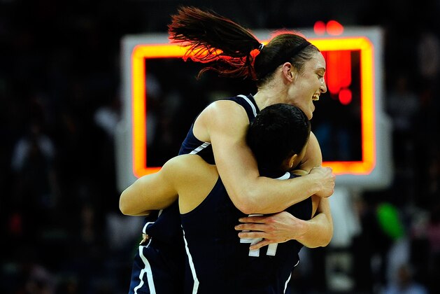 NEW ORLEANS, LA - APRIL 07:  Stefanie Dolson #31 and Kiah Stokes #41 of the Connecticut Huskies celebrate victory over the Notre Dame Fighting Irish in the National Semifinal game of the 2013 NCAA  Division I Women's Basketball Championship at the New Orleans Arena on April 7, 2013 in New Orleans, Louisiana.  Connecticut won the game 83-65.  (Photo by Stacy Revere/Getty Images)