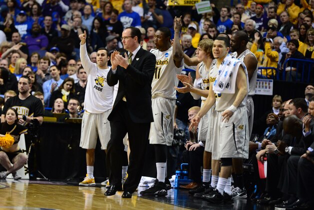 Mar 21, 2014; St. Louis, MO, USA; Wichita State Shockers head coach Gregg Marshall and the bench celebrate against the Cal Poly Mustangs in the second half during the 2nd round of the 2014 NCAA Men's Basketball Championship at Scottrade Center. Mandatory Credit: Jasen Vinlove-USA TODAY Sports Mar 21, 2014; St. Louis, MO, USA; Wichita State Shockers head coach Gregg Marshall and the bench celebrate against the Cal Poly Mustangs in the second half during the 2nd round of the 2014 NCAA Men's Basketball Championship at Scottrade Center. Mandatory Credit: Jasen Vinlove-USA TODAY Sports