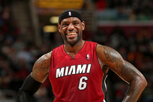 CLEVELAND, OH - MARCH 18:  LeBron James #6 of the Miami Heat smiles during the game against the Cleveland Cavaliers at The Quicken Loans Arena on March 18, 2014 in Cleveland, Ohio. NOTE TO USER: User expressly acknowledges and agrees that, by downloading and/or using this Photograph, user is consenting to the terms and conditions of the Getty Images License Agreement. Mandatory Copyright Notice: Copyright 2014 NBAE (Photo by Joe Murphy/NBAE via Getty Images)
