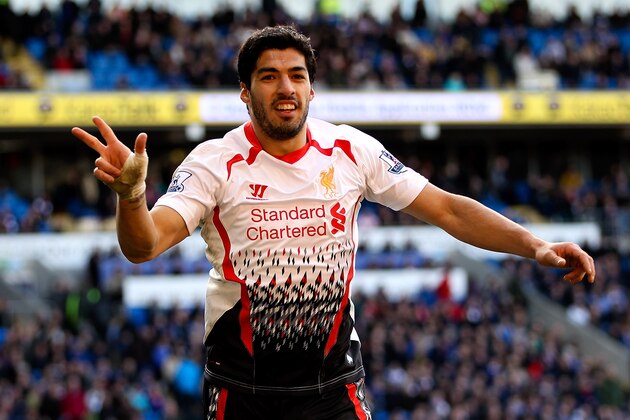 CARDIFF, WALES - MARCH 22:  Luis Suarez of Liverpool celebrates after scoring hihs third and his team's sixth goal of the game during the Barclays Premier League match between Cardiff City and Liverpool at Cardiff City Stadium on March 22, 2014 in Cardiff, Wales.  (Photo by Ben Hoskins/Getty Images)