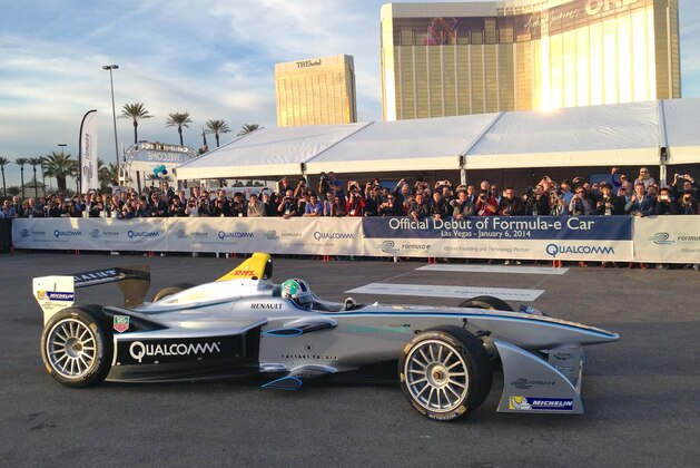 A new all-electric race car, the Spark-Renault SRT 01E Formula E, is taken on a demonstration drive by Brazilian Formula One driver Lucas di Grassi on the grounds of the Mandalay Bay hotel-casino in Las Vegas Monday, Jan. 6, 2013. Organizers of the FIA Formula E Championship, the first series exclusively for electric cars, are giving racing aficionados their first chance to see a fully-electric car in action. (AP Photo/Hannah Dreier)