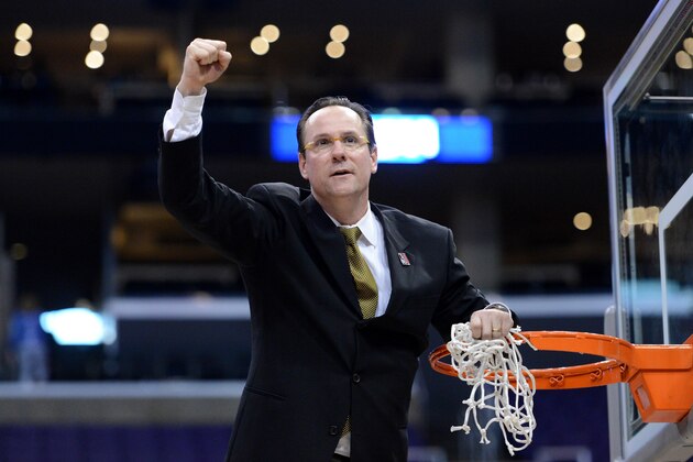 LOS ANGELES, CA - MARCH 30:  Head coach Gregg Marshall of the Wichita State Shockers celebrates by cutting down the net after defeating the Ohio State Buckeyes 70-66 during the West Regional Final of the 2013 NCAA Men's Basketball Tournament at Staples Center on March 30, 2013 in Los Angeles, California.  (Photo by Harry How/Getty Images)