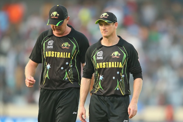 DHAKA, BANGLADESH - MARCH 23:  Doug Bollinger and George Bailey of Australia leave the field after the Pakistan innings during the ICC World Twenty20 Bangladesh 2014 match between Australia and Pakistan at Sher-e-Bangla Mirpur Stadium on March 23, 2014 in Dhaka, Bangladesh.  (Photo by Scott Barbour/Getty Images)