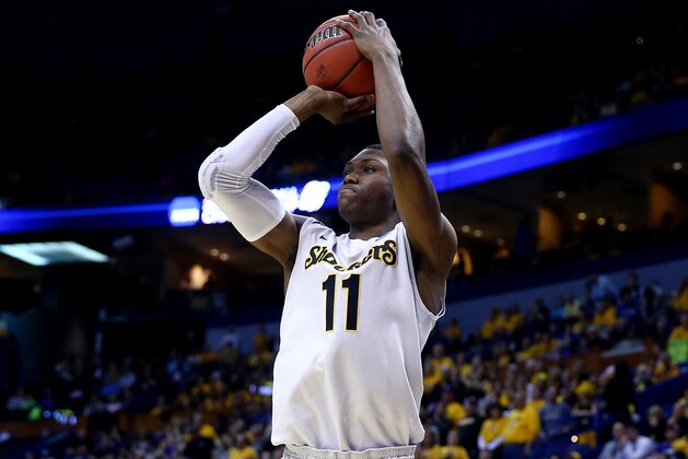 ST LOUIS, MO - MARCH 21:  Cleanthony Early #11 of the Wichita State Shockers takes a shot against the Cal Poly Mustangs during the second round of the 2014 NCAA Men's Basketball Tournament at the Scottrade Center on March 21, 2014 in St Louis, Missouri.  (Photo by Andy Lyons/Getty Images)