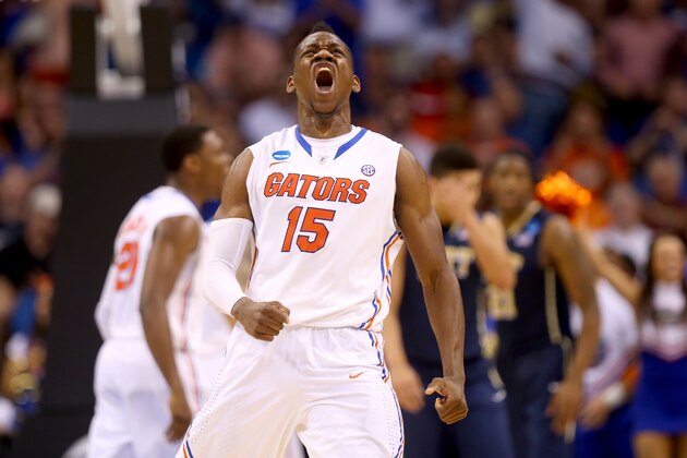 ORLANDO, FL - MARCH 22:  Will Yeguete #15 of the Florida Gators reacts in the second half while taking on the Pittsburgh Panthers during the third round of the 2014 NCAA Men's Basketball Tournament at Amway Center on March 22, 2014 in Orlando, Florida.  (Photo by Mike Ehrmann/Getty Images)