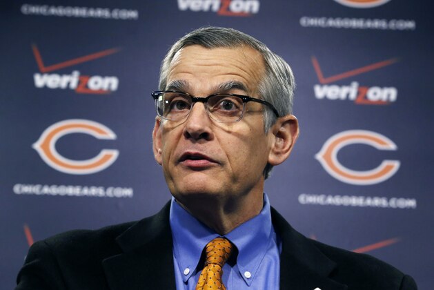 Chicago Bears' general manager Phil Emery talks about free agents, defensive end Lamarr Houston and safety Ryan Mundy, after they were signed during an NFL football news conference Wednesday, March 12, 2014, in Lake Forest, Ill. (AP Photo/Charles Rex Arbogast)