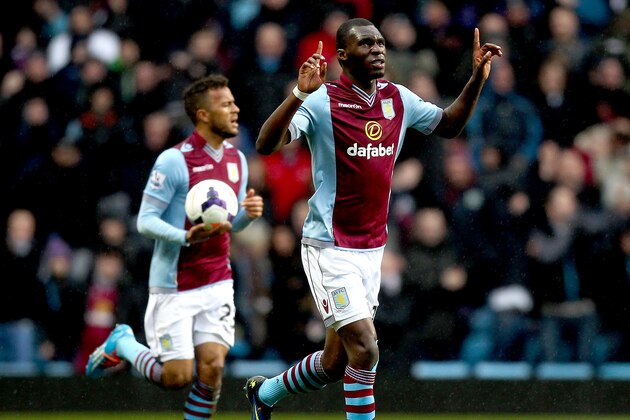 BIRMINGHAM, ENGLAND - MARCH 02: Christian Benteke of Aston villa celebrates after scoring his team's first goal of the game during the Barclays Premier League match between Aston Villa and Norwich City at Villa Park on March 2, 2014 in Birmingham, England.  (Photo by Ben Hoskins/Getty Images)