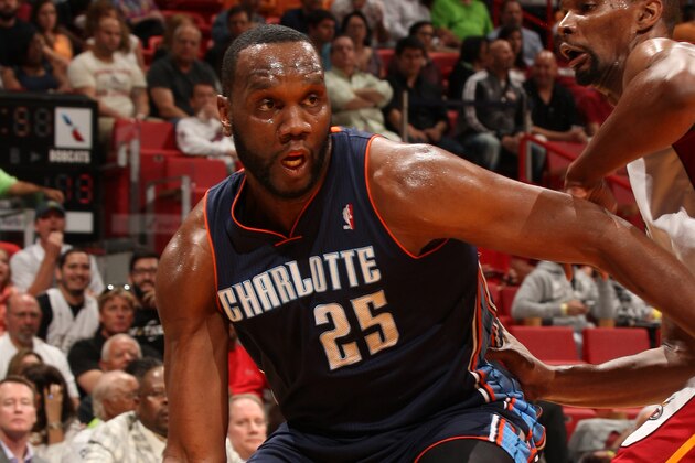 MIAMI, FL - March 3: Al Jefferson #25 of the Charlotte Bobcats drives to the basket against the Miami Heat at the American Airlines Arena in Miami, Florida on Mar. 3, 2014. NOTE TO USER: User expressly acknowledges and agrees that, by downloading and/or using this photograph, user is consenting to the terms and conditions of the Getty Images License Agreement. Mandatory copyright notice: Copyright NBAE 2014 (Photo by Oscar Baldizon/NBAE via Getty Images)