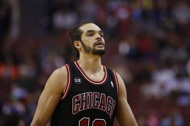 Chicago Bulls' Joakim Noah in action during an NBA basketball game against the Philadelphia 76ers, Wednesday, March 19, 2014, in Philadelphia. (AP Photo/Matt Slocum)