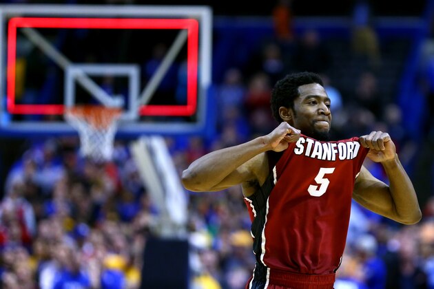 ST LOUIS, MO - MARCH 23:  Chasson Randle #5 of the Stanford Cardinal celebrates defeating the Kansas Jayhawks 60 to 57 during the third round of the 2014 NCAA Men's Basketball Tournament at Scottrade Center on March 23, 2014 in St Louis, Missouri.  (Photo by Dilip Vishwanat/Getty Images)