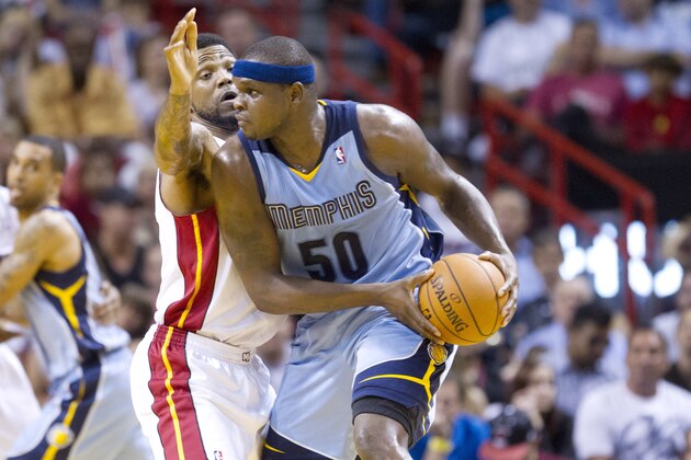 Miami Heat's Udonis Haslem blocks Memphis Grizzlies' Zach Randolph during the first half of an NBA basketball game in Miami, Friday, March 21, 2014. (AP Photo/J Pat Carter)