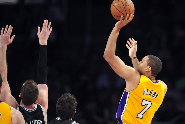 March 19, 2014; Los Angeles, CA, USA; Los Angeles Lakers forward Xavier Henry (7) shoots against the San Antonio Spurs during the second half at Staples Center. Mandatory Credit: Gary A. Vasquez-USA TODAY Sports