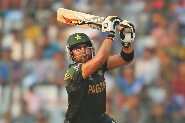 DHAKA, BANGLADESH - MARCH 23:  Umar Akmal of Pakistan bats during the ICC World Twenty20 Bangladesh 2014 match between Australia and Pakistan at Sher-e-Bangla Mirpur Stadium on March 23, 2014 in Dhaka, Bangladesh.  (Photo by Scott Barbour/Getty Images)