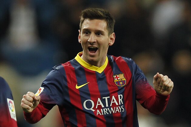 Barcelona's Lionel Messi from Argentina, celebrates their victory during a Spanish La Liga soccer match between Real Madrid and FC Barcelona at the Santiago Bernabeu  stadium in Madrid, Spain, Sunday, March 23, 2014. (AP Photo/Andres Kudacki)