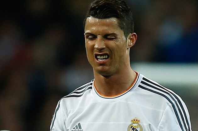 MADRID, SPAIN - MARCH 23:  Cristiano Ronaldo of Real Madrid grimaces during the La Liga match between Real Madrid CF and FC Barcelona at the Bernabeu on March 23, 2014 in Madrid, Spain.  (Photo by Gonzalo Arroyo Moreno/Getty Images)