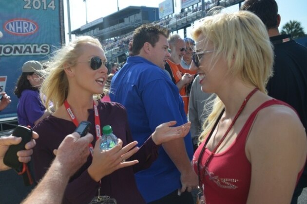 Chelsea Gates interviews Courtney Force before introductions at Auto Plus Raceway in Gainesville.