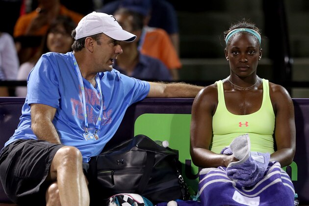 KEY BISCAYNE, FL - MARCH 23:  Coach Paul Annacone confers with Sloane Stephens between sets against Caroline Wozniacki of Denmark during the Sony Open at the Crandon Park Tennis Center on March 23, 2014 in Key Biscayne, Florida.  (Photo by Matthew Stockman/Getty Images)