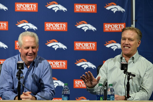 Jan 14, 2013; Englewood, CO, USA; Denver Broncos head coach John Fox (left) and executive vice president of football operations John Elway (right) during the press conference following the loss in the AFC divisional round playoff game at the teams training facility. Mandatory Credit: Ron Chenoy-USA TODAY Sports