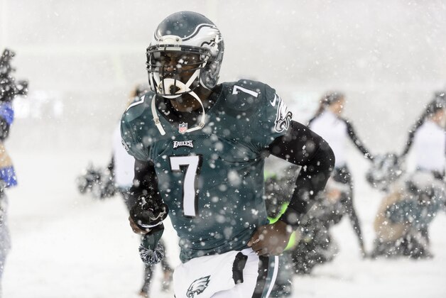 Dec 8, 2013; Philadelphia, PA, USA; Philadelphia Eagles quarterback Michael Vick (7) runs onto the field prior to the game against the Detroit Lions at Lincoln Financial Field. The Eagles defeated the Lions 34-20. Mandatory Credit: Howard Smith-USA TODAY Sports