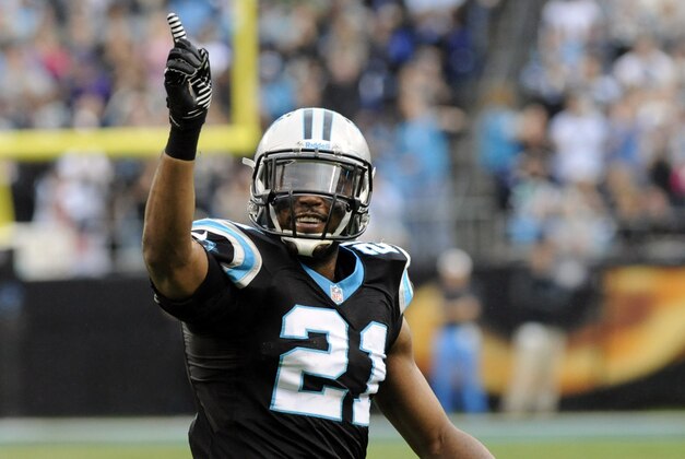 Dec 22, 2013; Charlotte, NC, USA; Carolina Panthers safety Mike Mitchell (21) celebrates breaking up a pass by the New Orleans Saints during the second quarter of the game at Bank of America Stadium. Mandatory Credit: Sam Sharpe-USA TODAY Sports