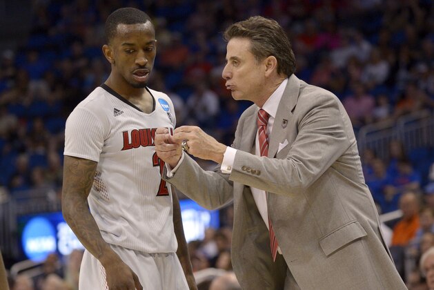 Louisville coach Rick Pitino yells at Louisville guard Russ Smith (2) during the second half in a third-round game in the NCAA college basketball tournament against Saint Louis, Saturday, March 22, 2014, in Orlando, Fla. (AP Photo/Phelan M. Ebenhack) Louisville coach Rick Pitino yells at Louisville guard Russ Smith (2) during the second half in a third-round game in the NCAA college basketball tournament against Saint Louis, Saturday, March 22, 2014, in Orlando, Fla. (AP Photo/Phelan M. Ebenhack)