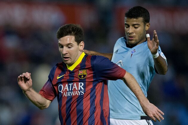 VIGO, SPAIN - OCTOBER 29: Lionel Messi (L) of FC Barcelona competes for the ball with Rafinha Alcantara (R) of RC Celta de Vigo during the La Liga match between RC Celta de Vigo and FC Barcelona at Estadio Balaidos on October 29, 2013 in Vigo, Spain. (Photo by Gonzalo Arroyo Moreno/Getty Images) VIGO, SPAIN - OCTOBER 29: Lionel Messi (L) of FC Barcelona competes for the ball with Rafinha Alcantara (R) of RC Celta de Vigo during the La Liga match between RC Celta de Vigo and FC Barcelona at Estadio Balaidos on October 29, 2013 in Vigo, Spain. (Photo by Gonzalo Arroyo Moreno/Getty Images)