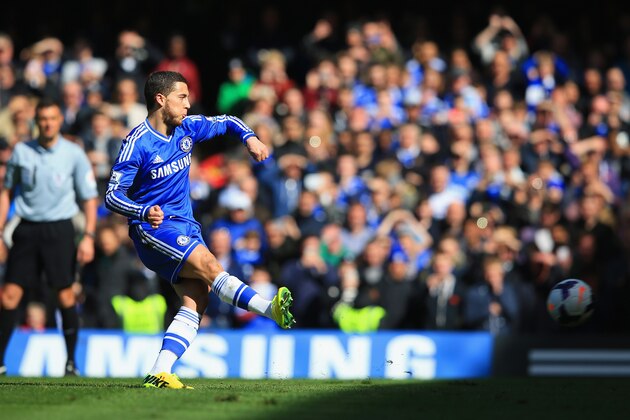 LONDON, ENGLAND - MARCH 22: Eden Hazard of Chelsea scores their third goal from the penalty spot during the Barclays Premier League match between Chelsea and Arsenal at Stamford Bridge on March 22, 2014 in London, England.  (Photo by Richard Heathcote/Getty Images)