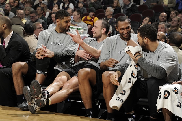 CLEVELAND, OH - MARCH 4:  Tim Duncan #21, Tony Parker #9, Boris Diaw #33 and Jeff Ayres #11 of the San Antonio Spurs talk amongst themselves in the fourth quarter while they have a comfortable lead over the Cleveland Cavaliers at The Quicken Loans Arena on March 4, 2014 in Cleveland, Ohio. NOTE TO USER: User expressly acknowledges and agrees that, by downloading and/or using this Photograph, user is consenting to the terms and conditions of the Getty Images License Agreement. Mandatory Copyright Notice: Copyright 2014 NBAE (Photo by David Liam Kyle/NBAE via Getty Images)