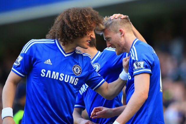 LONDON, ENGLAND - MARCH 22:  Andre Schurrle of Chelsea celebrates the second goal with David Luiz of Chelsea during the Barclays Premier League match between Chelsea and Arsenal at Stamford Bridge on March 22, 2014 in London, England.  (Photo by Richard Heathcote/Getty Images)