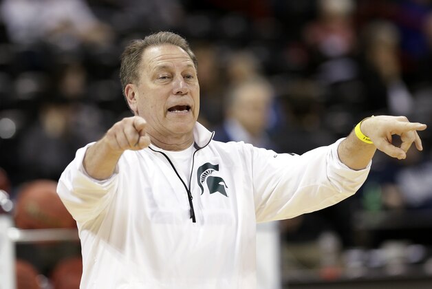 Michigan State head coach Tom Izzo directs his team during practice for the NCAA college basketball tournament in Spokane, Wash., Wednesday, March 19, 2014. Michigan State plays against Delaware in a second round game on Thursday. (AP Photo/Elaine Thompson)