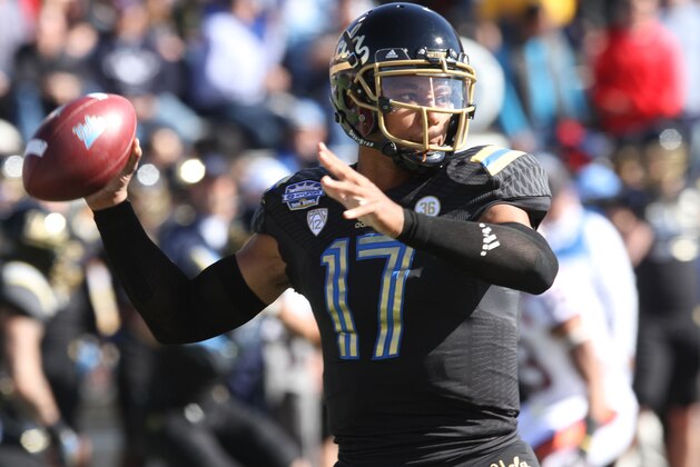 UCLA quarterback Brett Hundley throws a pass against Virginia Tech during the Sun Bowl NCAA college football game Tuesday Dec. 31, 2013. (AP Photo/Victor Calzada)
