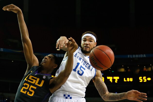 ATLANTA, GA - MARCH 14:  Willie Cauley-Stein #15 of the Kentucky Wildcats blocks a shot by Jordan Mickey #25 of the LSU Tigers during the quarterfinals of the SEC Men's Basketball Tournament at Georgia Dome on March 14, 2014 in Atlanta, Georgia.  (Photo by Kevin C. Cox/Getty Images)