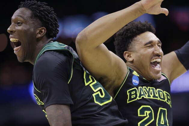 Baylor's Taurean Prince, left, and Ish Wainright, right, celebrate their win over Creighton in a third-round game in the NCAA college basketball tournament Sunday, March 23, 2014, in San Antonio. Baylor won 85-55. (AP Photo/David J. Phillip)