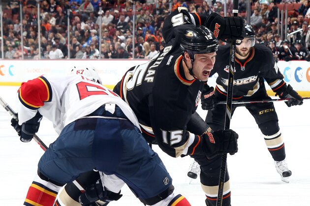 ANAHEIM, CA - MARCH 23:  Ryan Getzlaf #15 of the Anaheim Ducks battles for position against Vincent Trocheck #67 of the Florida Panthers on March 23, 2014 at Honda Center in Anaheim, California. (Photo by Debora Robinson/NHLI via Getty Images)
