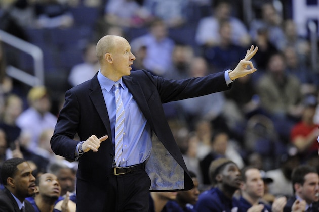 Xavier head coach Chris Mack gestures during the second half of an NCAA college basketball game against Georgetown, Saturday, Feb. 22, 2014, in Washington. Georgetown won 74-52. (AP Photo/Nick Wass)
