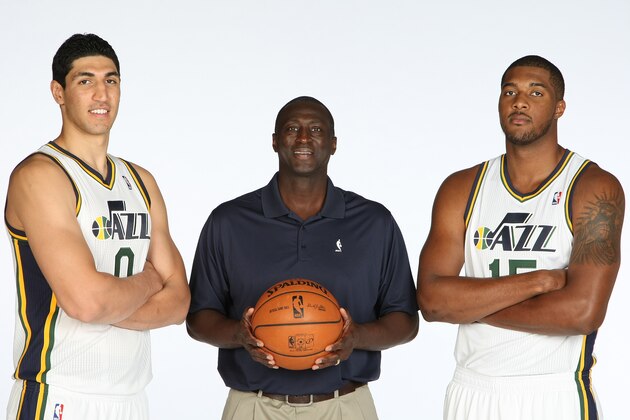 SALT LAKE CITY, UT - SEPTEMBER 30:  (from left) Enes Kanter #0, Tyrone Corbin Head Coach and Derrick Favors #15 of the Utah Jazz pose for a photo during 2013 Media Day at Zions Basketball Center on September 30, 2013 in Salt Lake City, Utah. NOTE TO USER: User expressly acknowledges and agrees that, by downloading and or using this Photograph, User is consenting to the terms and conditions of the Getty Images License Agreement. Mandatory Copyright Notice: Copyright 2013 NBAE (Photo by Melissa Majchrzak/NBAE via Getty Images)