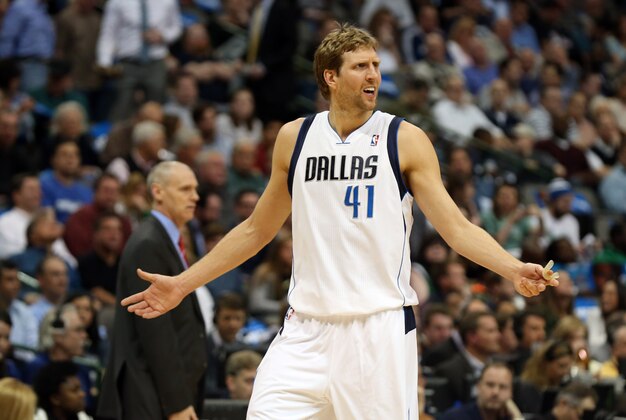 Mar 19, 2014; Dallas, TX, USA; Dallas Mavericks forward Dirk Nowitzki (41) argues after receiving his second personal foul early in the game against the Minnesota Timberwolves at American Airlines Center. Mandatory Credit: Matthew Emmons-USA TODAY Sports