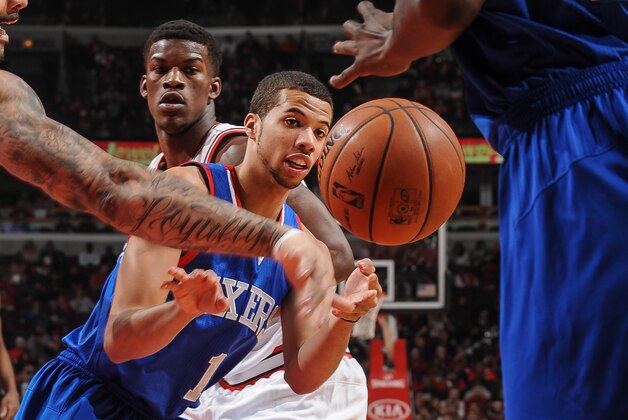 CHICAGO, IL - MARCH 22: Michael Carter-Williams #1 of the Philadelphia 76ers passes against the Chicago Bulls on March 22, 2013 at the United Center in Chicago, Illinois. NOTE TO USER: User expressly acknowledges and agrees that, by downloading and or using this Photograph, user is consenting to the terms and conditions of the Getty Images License Agreement. Mandatory Copyright Notice: Copyright 2013 NBAE (Photo by Randy Belice/NBAE via Getty Images)