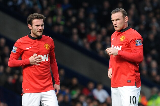 Manchester United's Juan Mata, left, and Wayne Rooney during the English Premier League soccer match between West Bromwich Albion and Manchester United at The Hawthorns Stadium in West Bromwich, England, Saturday, March 8, 2014. (AP Photo/Rui Vieira) Manchester United's Juan Mata, left, and Wayne Rooney during the English Premier League soccer match between West Bromwich Albion and Manchester United at The Hawthorns Stadium in West Bromwich, England, Saturday, March 8, 2014. (AP Photo/Rui Vieira)