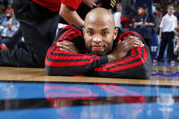 DALLAS, TX - FEBRUARY 28: Taj Gibson #22 of the Chicago Bulls stretches before a game against the Dallas Mavericks on February 28, 2014 at the American Airlines Center in Dallas, Texas. NOTE TO USER: User expressly acknowledges and agrees that, by downloading and or using this photograph, User is consenting to the terms and conditions of the Getty Images License Agreement. Mandatory Copyright Notice: Copyright 2014 NBAE (Photo by Glenn James/NBAE via Getty Images)