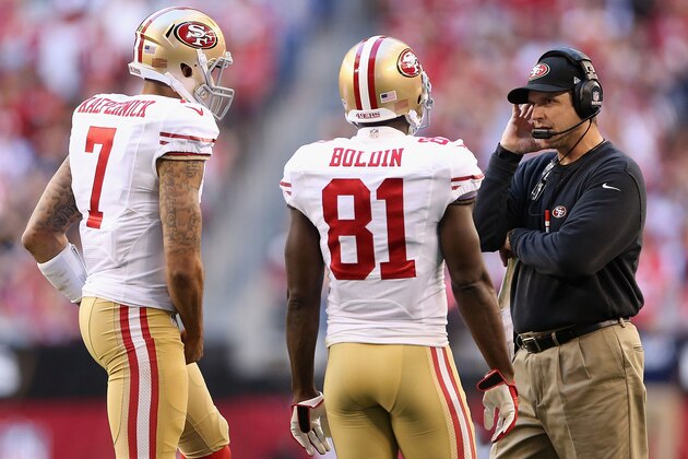 GLENDALE, AZ - DECEMBER 29:  Quarterback Colin Kaepernick #7, wide receiver Anquan Boldin #81 and head coach Jim Harbaugh of the San Francisco 49ers during the NFL game against the Arizona Cardinals at the University of Phoenix Stadium on December 29, 2013 in Glendale, Arizona.  The 49ers defeated the Cardinals 23-20.  (Photo by Christian Petersen/Getty Images)