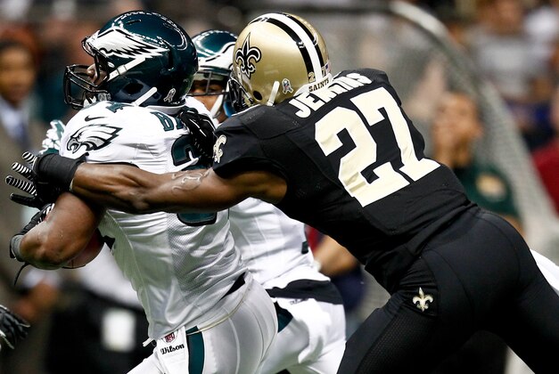 November 5, 2012; New Orleans, LA, USA; Philadelphia Eagles running back Bryce Brown (34) is chased by New Orleans Saints free safety Malcolm Jenkins (27) during the first half of a game at the Mercedes-Benz Superdome. Mandatory Credit: Derick E. Hingle-USA TODAY Sports