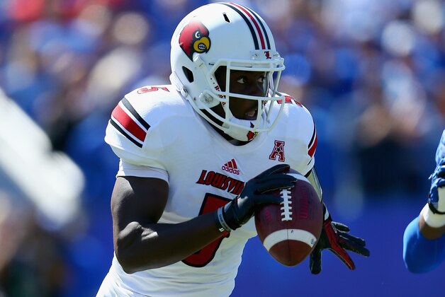 LEXINGTON, KY - SEPTEMBER 14:  Teddy Bridgewater #5 of the Louisville Cardinals runs with the ball  during the game against the Kentucky Wildcats at Commonwealth Stadium on September 14, 2013 in Lexington, Kentucky.  (Photo by Andy Lyons/Getty Images)